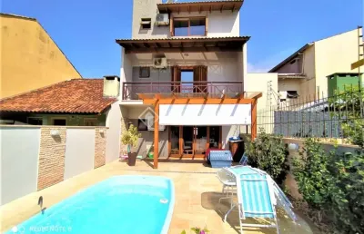 Casa com 3 quartos à venda na rua romano rolando botin, 155, hípica, porto alegre, 141 m2 por r$ 689.000