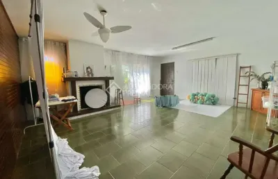 Casa com 5 quartos à venda na rua engenheiro tito marques fernandes, 65, ipanema, porto alegre, 206 m2 por r$ 1.249.000