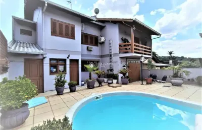 Casa com 3 quartos à venda na rua novo hamburgo, 365, sol nascente, estância velha, 304 m2 por r$ 959.000