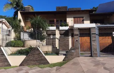 Casa com 3 quartos à venda na rua gustavo leopoldo feltes, 825, canudos, novo hamburgo, 283 m2 por r$ 989.000