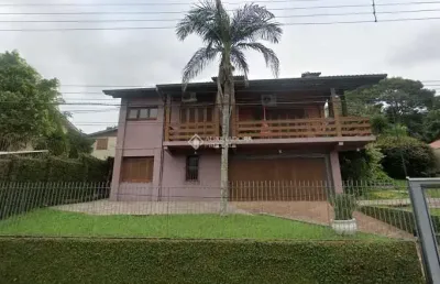 Casa com 4 quartos à venda na rua tubarão, 433, primavera, novo hamburgo, 267 m2 por r$ 790.000