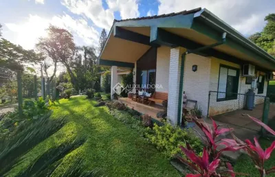 Casa com 6 quartos à venda na guilherme poschetzky, 77, vila nova, novo hamburgo, 329 m2 por r$ 2.100.000