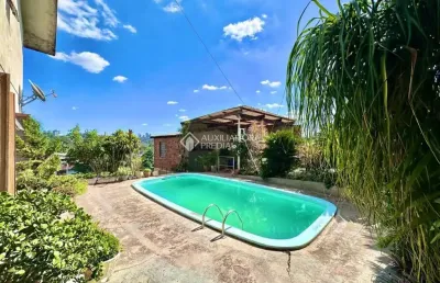 Casa com 4 quartos à venda na rua guilherme vielitz, 467, canudos, novo hamburgo, 220 m2 por r$ 585.000
