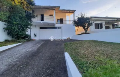 Casa com 3 quartos à venda na rua doutor miguel vieira ferreira, 20, petrópolis, novo hamburgo, 176 m2 por r$ 650.000