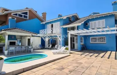 Casa em condomínio fechado com 4 quartos à venda na avenida paraguassu, 724, centro, xangri-lá, 244 m2 por r$ 1.999.990