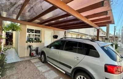 Casa em condomínio fechado com 2 quartos à venda na rua maria olinda telles, 900, canudos, novo hamburgo, 103 m2 por r$ 298.000