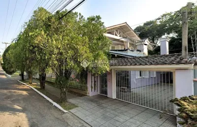 Casa com 4 quartos à venda na rua gustavo leopoldo feltes, 275, canudos, novo hamburgo, 276 m2 por r$ 450.000