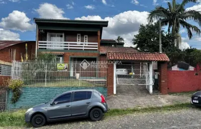 Casa com 3 quartos à venda na ucrânia, 172, canudos, novo hamburgo, 232 m2 por r$ 470.000