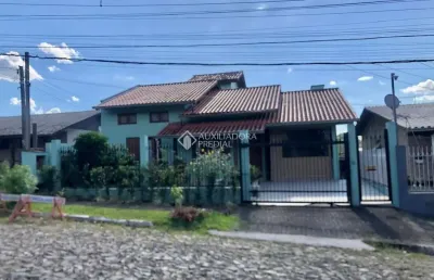 Casa com 3 quartos à venda na chile, 63, petrópolis, novo hamburgo, 115 m2 por r$ 480.000