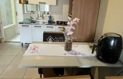 Casa em condomínio fechado com 2 quartos à venda na rua angola, 99, feitoria, são leopoldo, 95 m2 por r$ 245.000