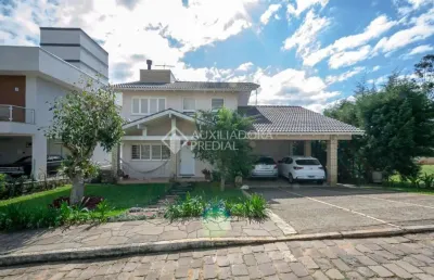 Casa em condomínio fechado com 3 quartos à venda na estrada martin luther, 700, lomba grande, novo hamburgo, 300 m2 por r$ 980.000