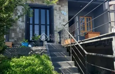 Casa em condomínio fechado com 3 quartos à venda na alberto almiro jost, 96, morada da brisa, campo bom, 133 m2 por r$ 400.000