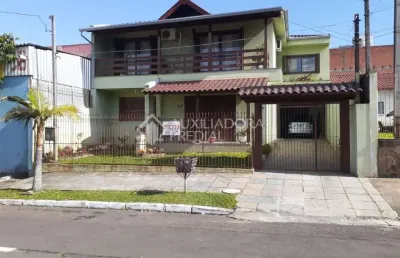 Casa em condomínio fechado com 4 quartos à venda na avenida joão neves da fontoura, 105, parque amador, esteio, 317 m2 por r$ 835.000