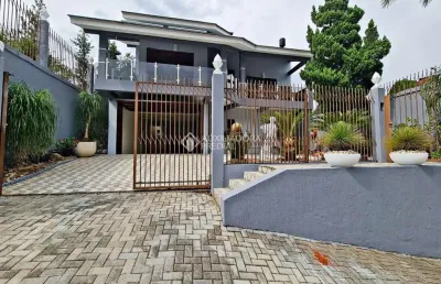 Casa em condomínio fechado com 4 quartos à venda na rua itaqui, 173, imigrante norte, campo bom, 265 m2 por r$ 1.100.000