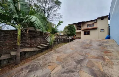 Casa em condomínio fechado com 3 quartos à venda na rua adriano hugo bender, 128, santo afonso, novo hamburgo, 111 m2 por r$ 520.000