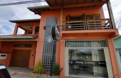 Casa em condomínio fechado com 3 quartos à venda na rua américa, 911, canudos, novo hamburgo, 390 m2 por r$ 890.000
