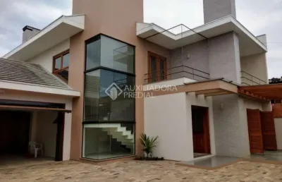 Casa em condomínio fechado com 3 quartos à venda na albano hansen, 1542, travessão, dois irmãos, 238 m2 por r$ 1.140.000