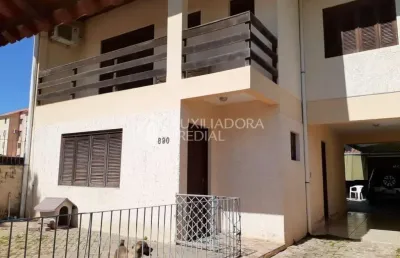 Casa em condomínio fechado com 3 quartos à venda na rua oswaldo arthur hartz, 890, canudos, novo hamburgo, 140 m2 por r$ 480.000