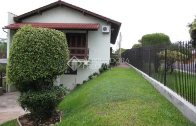 Casa em condomínio fechado com 3 quartos à venda na rua libéria, 399, rincão, novo hamburgo, 235 m2 por r$ 950.000