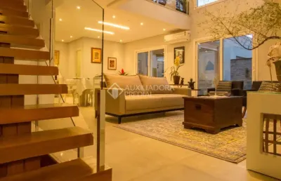 Casa em condomínio fechado com 3 quartos à venda na rua joão pedro schimitt, 715, rondônia, novo hamburgo, 181 m2 por r$ 1.075.000