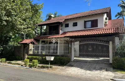 Casa em condomínio fechado com 4 quartos à venda na rua encruzilhada do sul, 505, mauá, novo hamburgo, 238 m2 por r$ 980.000