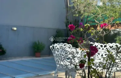Casa em condomínio fechado com 3 quartos à venda na rua guarujá, 587, ideal, novo hamburgo, 237 m2 por r$ 626.000