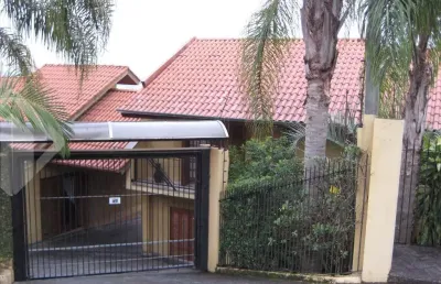 Casa em condomínio fechado com 4 quartos à venda na rua gramado, 478, ouro branco, novo hamburgo, 380 m2 por r$ 1.350.000