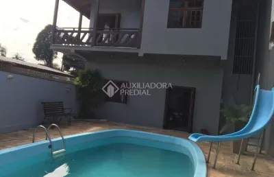 Casa em condomínio fechado com 3 quartos à venda na rua colúmbia, 133, canudos, novo hamburgo, 637 m2 por r$ 1.330.000