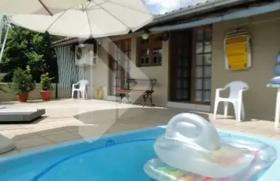 Casa em condomínio fechado com 3 quartos à venda na rua prudente de moraes, 421, guarani, novo hamburgo, 180 m2 por r$ 650.000