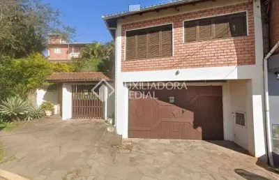 Casa em condomínio fechado com 4 quartos à venda na rua joão aloysio algayer, 1906, lomba grande, novo hamburgo, 360 m2 por r$ 1.000.000
