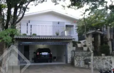 Casa em condomínio fechado com 3 quartos à venda na rua gomes portinho, 902, centro, novo hamburgo, 191 m2 por r$ 900.000