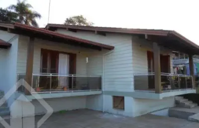 Casa em condomínio fechado com 3 quartos à venda na balduinho dregher, 166, centro, campo bom, 126 m2 por r$ 740.000