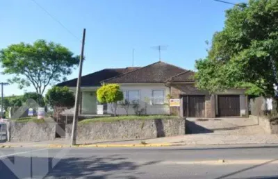 Casa em condomínio fechado com 4 quartos à venda na avenida general daltro filho, 1809, canudos, novo hamburgo, 300 m2 por r$ 1.060.000