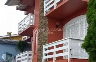Casa em condomínio fechado com 3 quartos à venda na rua osvaldo cruz, 1473, primavera, novo hamburgo, 399 m2 por r$ 890.000