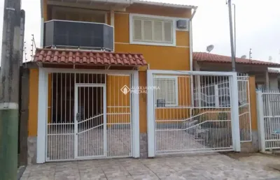 Casa com 3 quartos à venda na rua condores, 446, jardim algarve, alvorada, 119 m2 por r$ 590.000