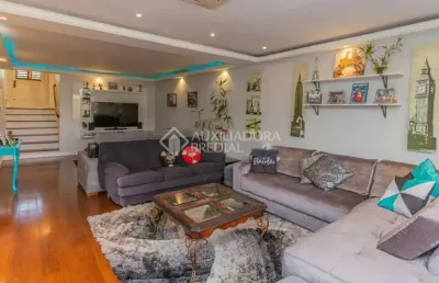 Casa em condomínio fechado com 4 quartos à venda na rua luiz voelcker, 351, três figueiras, porto alegre, 243 m2 por r$ 1.650.000