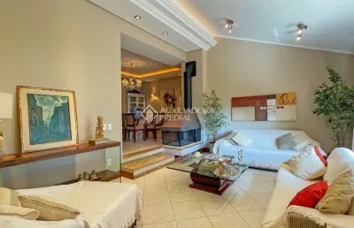 Casa com 4 quartos à venda na rua moema, 547, chácara das pedras, porto alegre, 313 m2 por r$ 2.177.000