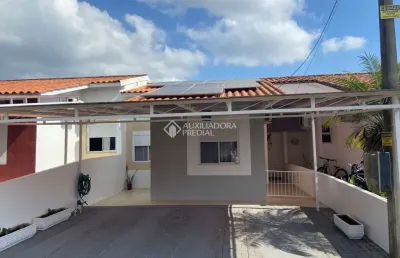 Casa em condomínio fechado com 2 quartos à venda na acesso terra nova, 501, terra nova, alvorada, 86 m2 por r$ 525.000