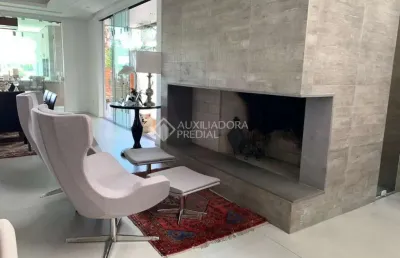 Casa em condomínio fechado com 3 quartos à venda na avenida juca batista, 9000, cavalhada, porto alegre, 339 m2 por r$ 4.200.000