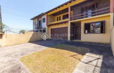 Casa em condomínio fechado com 3 quartos à venda na avenida ipê, 298, vila jardim, porto alegre, 192 m2 por r$ 900.000