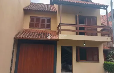 Casa em condomínio fechado com 3 quartos à venda na orleans, 105, guarujá, porto alegre, 207 m2 por r$ 435.000