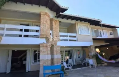Casa com 3 quartos à venda na rua paná paná, 892, atlântida, xangri-lá, 236 m2 por r$ 890.000
