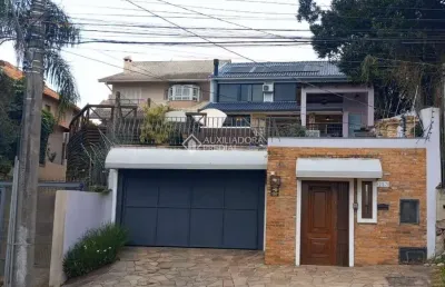 Casa em condomínio fechado com 3 quartos à venda na rua charruas, 257, espírito santo, porto alegre, 390 m2 por r$ 1.750.000