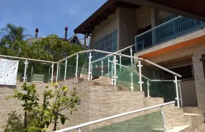 Casa com 4 quartos à venda na rua senador annibal di primio beck, 177, boa vista, porto alegre, 451 m2 por r$ 1.690.000