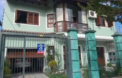 Casa com 5 quartos à venda na rua doutor telmo vergara, 554, partenon, porto alegre, 331 m2 por r$ 1.199.000