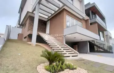 Casa em condomínio fechado com 4 quartos à venda na rua adolfo inácio de barcelos, 1490, centro, gravataí, 266 m2 por r$ 1.929.000