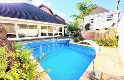 Casa em condomínio fechado com 3 quartos à venda na rua doutor arnaldo da silva ferreira, 465, jardim isabel, porto alegre, 209 m2 por r$ 1.350.000