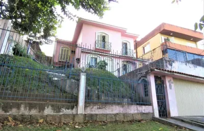 Casa em condomínio fechado com 4 quartos à venda na avenida silva paes, 1715, medianeira, porto alegre, 264 m2 por r$ 980.000