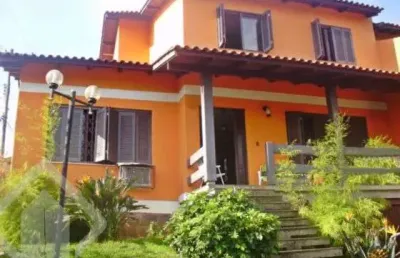 Casa em condomínio fechado com 5 quartos à venda na rua ângelo passuelo, 79, vila nova, porto alegre, 215 m2 por r$ 650.000