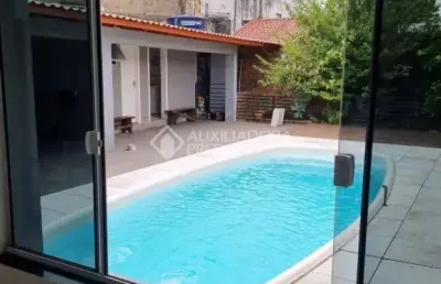Casa com 3 quartos à venda na rua olegário dias maciel, 78, espírito santo, porto alegre, 217 m2 por r$ 685.000